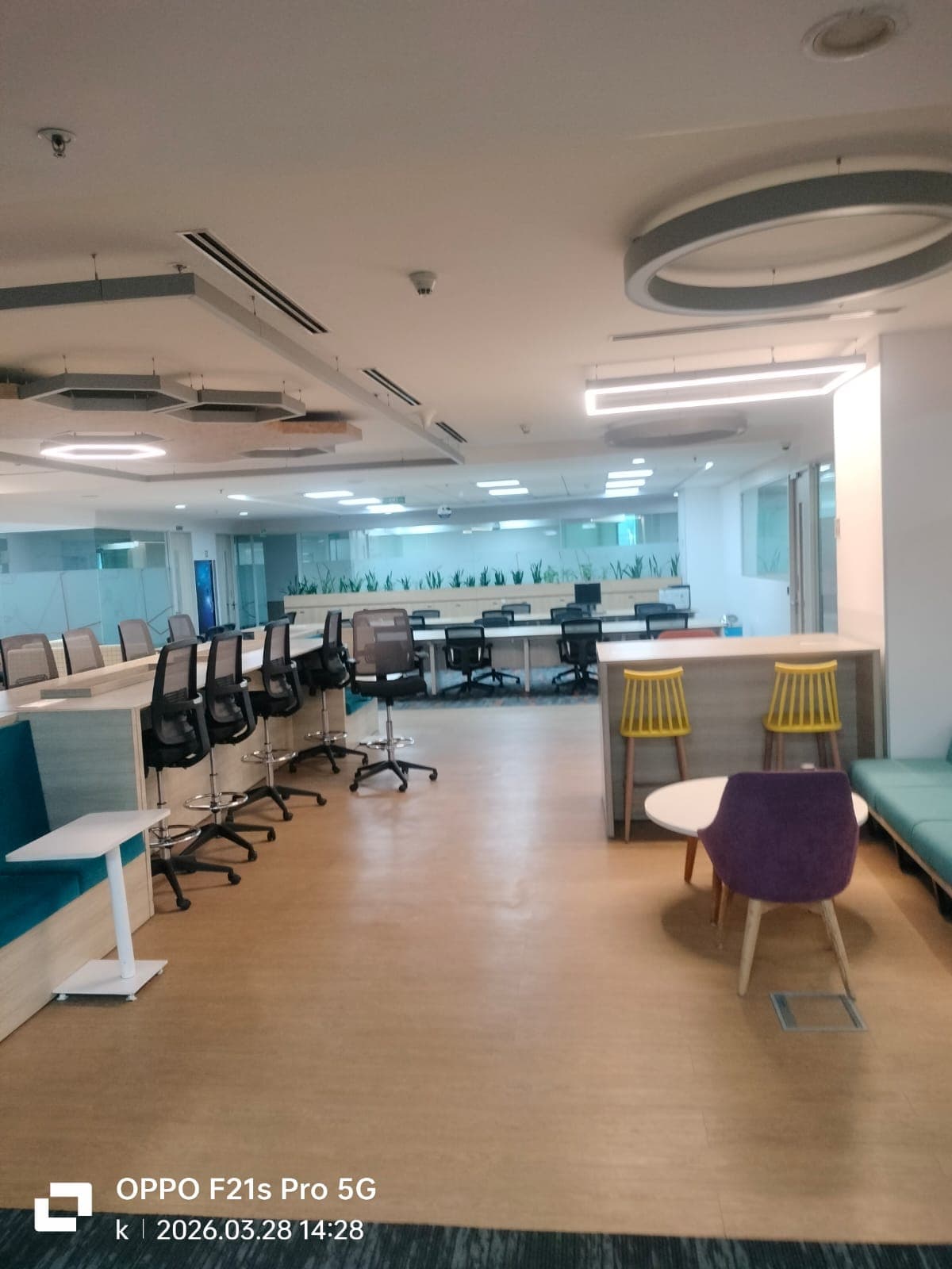 Interior design studio workspace with mood boards and fabric swatches